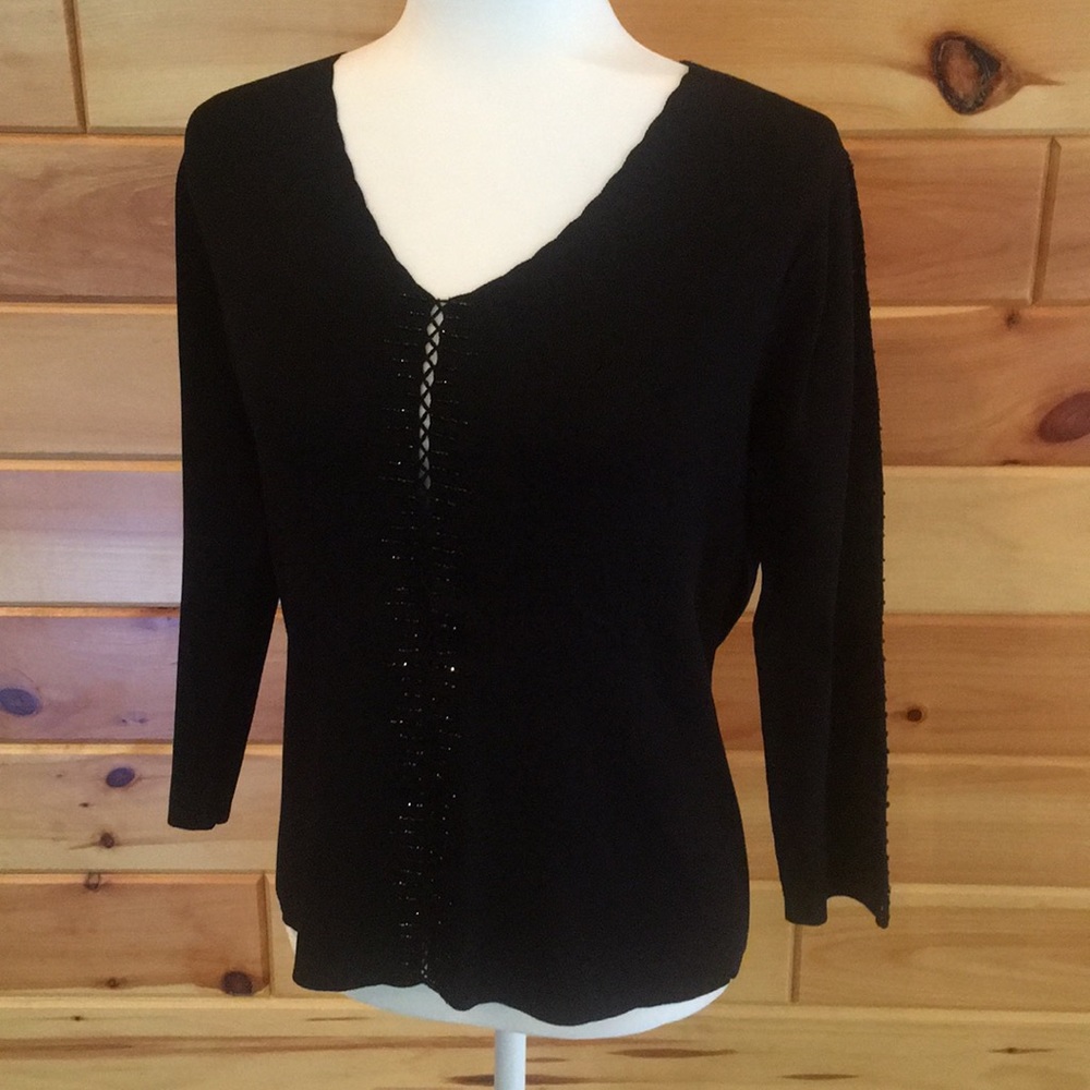 Elegant black beaded top with detailed v-neck